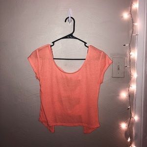 Short sleeved sherbet orange bow top